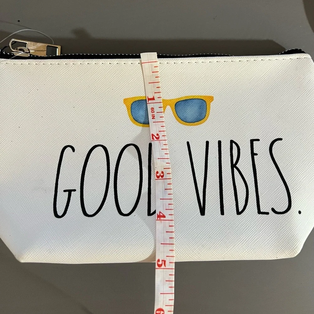 Rae Dunn White Pouch with Blue and Yellow Accents